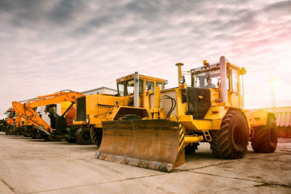 Two,Heavy,Wheeled,Tractor,One,Excavator,And,Other,Construction,Machinery