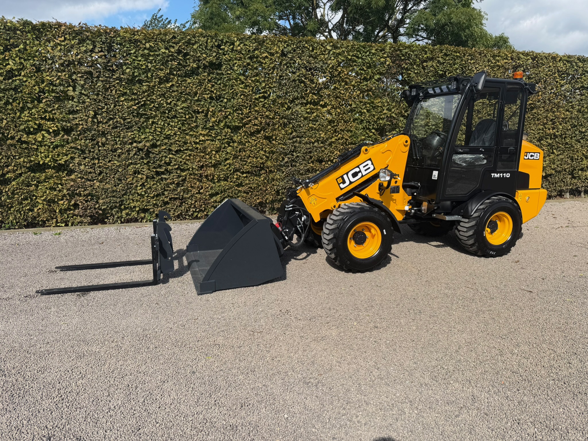 Kniklader JCB telescoop TM110 IMG